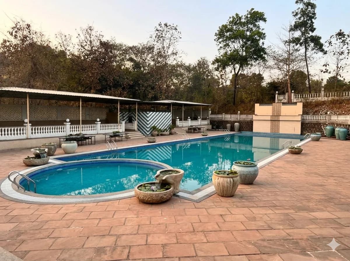 Resort swimming pool with a rounded kids' pool and stone planters