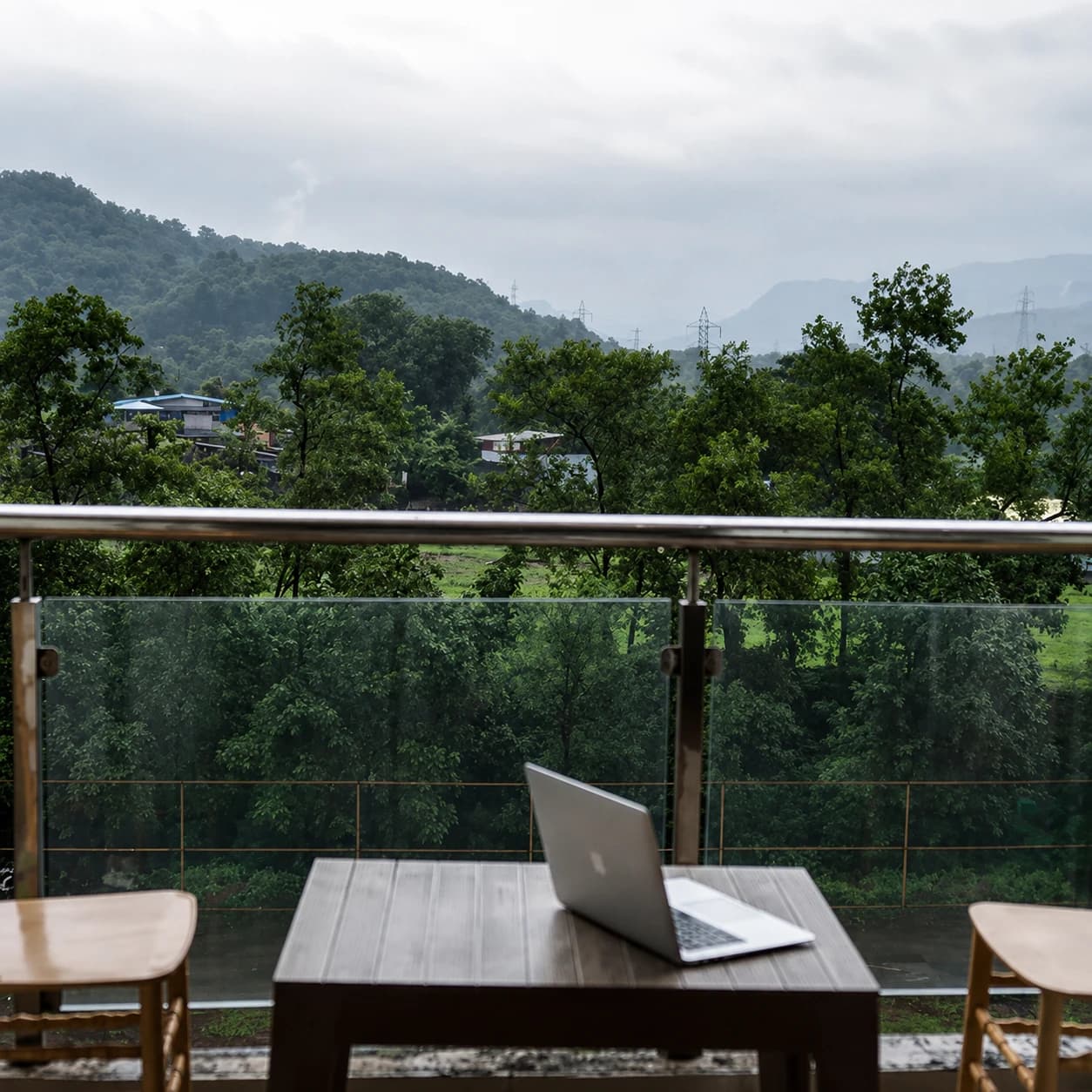 Balcony seating overlooking the Khopoli hills